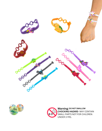 Colorful silicone character bracelets featuring dinosaurs and unicorns in assorted styles
